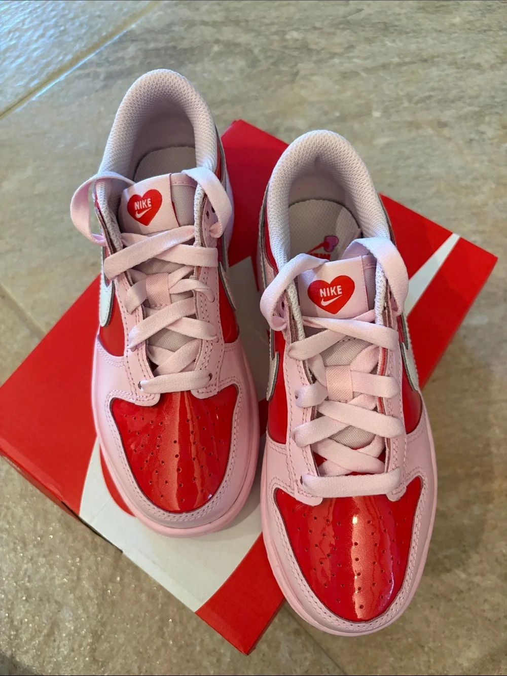 Nike Kids Pink and Red Low-Top Sneakers with White Swoosh